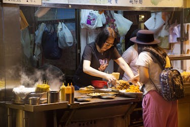 Visita turística y gastronómica privada en la calle Kowloon